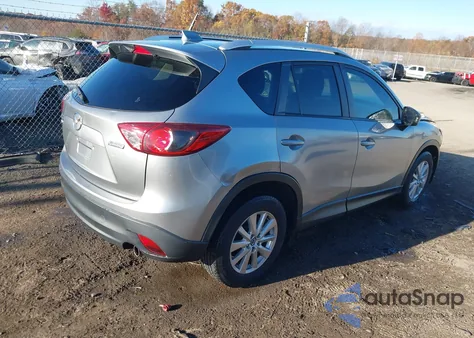 2014 Mazda Cx-5 Touring z USA, uszkodzony, nr VIN JM3KE4CY3E0393283
